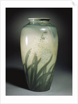 An earthenware vase depicting hyacinths and leafage in shades of ivory and green by Anonymous