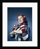 1960s Smiling Woman Wearing Red Mittens Ear Muff Blue Sweater Holding Ice Skates by Anonymous