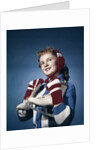 1960s Smiling Woman Wearing Red Mittens Ear Muff Blue Sweater Holding Ice Skates by Anonymous