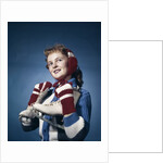 1960s Smiling Woman Wearing Red Mittens Ear Muff Blue Sweater Holding Ice Skates by Anonymous