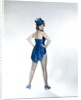 1960s Woman Looking Over Shoulder Wear Dance Costume Blue Sequined Top Hat Silk Tails Fishnet Seamed Stockings Looking At Camera by Anonymous