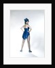 1960s Woman Looking Over Shoulder Wear Dance Costume Blue Sequined Top Hat Silk Tails Fishnet Seamed Stockings Looking At Camera by Anonymous