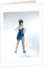 1960s Woman Looking Over Shoulder Wear Dance Costume Blue Sequined Top Hat Silk Tails Fishnet Seamed Stockings Looking At Camera by Anonymous