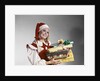1960s Young Woman In Red And White Santa Helper Costume And Hat Holding Pile Of Wrapped Christmas Presents Studio by Anonymous