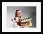 1960s Young Woman In Red And White Santa Helper Costume And Hat Holding Pile Of Wrapped Christmas Presents Studio by Anonymous