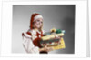 1960s Young Woman In Red And White Santa Helper Costume And Hat Holding Pile Of Wrapped Christmas Presents Studio by Anonymous