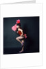 1960s Woman In American 1890s 1900s Wild West Saloon Showgirl Style Costume With Pink Ostrich Feather Fan Looking At Camera by Anonymous