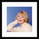 1970s Portrait Of Woman With Blond Hair And White Sweater by Anonymous