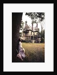 1960s 1970s Woman Standing Beside Tree Front Of Abandoned Haunted Victorian House by Anonymous
