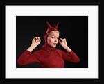 1960s Woman Red Devil Costume With Horns Arms Up In Air Looking Seductively At Camera by Anonymous
