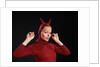 1960s Woman Red Devil Costume With Horns Arms Up In Air Looking Seductively At Camera by Anonymous