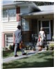 1950s Mother Daughter Waiting Steps House For Father Briefcase Coming Home Suburban Family Man Woman Girl Retro by Anonymous