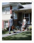 1950s Mother Daughter Waiting Steps House For Father Briefcase Coming Home Suburban Family Man Woman Girl Retro by Anonymous