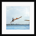 1970s Teen Girl Diving Into Swimming Pool by Anonymous