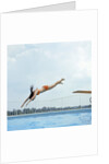 1970s Teen Girl Diving Into Swimming Pool by Anonymous