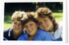 1980s Two Brothers And Their Sister Posed Heads Together Smiling Looking At Camera by Anonymous