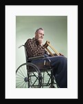 1960 1960s Retro Senior Man Sitting In Wheelchair With Crutches Blanket Wrapped Around Legs by Anonymous