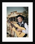 1960s Man Singing Cowboy Strumming Playing Acoustic Guitar by Anonymous