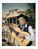 1960s Man Singing Cowboy Strumming Playing Acoustic Guitar by Anonymous