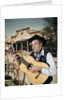 1960s Man Singing Cowboy Strumming Playing Acoustic Guitar by Anonymous