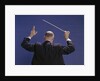 1950s 1960s 1970s View Of Back Of Bald Man Conducting A Symphony Orchestra by Anonymous