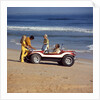 1970 1970s 2 Couples Men Women On Beach With Red White Dune Buggy Leisure Sport Lifestyle Vehicle Fun Summer by Anonymous