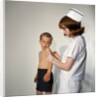 1960s Woman Nurse Give Injection Needle To Little Boy Arm Vaccine Vaccination Prevention Immunize Inoculate Medicine by Anonymous