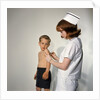 1960s Woman Nurse Give Injection Needle To Little Boy Arm Vaccine Vaccination Prevention Immunize Inoculate Medicine by Anonymous