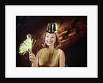 1960s Young Blonde Woman Party Hat Noisemaker Horn Smiling New Year Clock Background by Anonymous