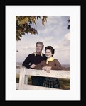 portrait Couple Husband & Wife Smiling Standing Together Behind White Board Fence Outdoor by Anonymous