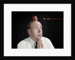 1960s Anxious Business Man Praying Looking Up At Arrow Heading Towards Apple Sitting On Top Of His Head by Anonymous