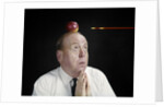 1960s Anxious Business Man Praying Looking Up At Arrow Heading Towards Apple Sitting On Top Of His Head by Anonymous