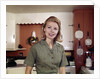 1960s Portrait Young Blonde Woman Housewife In Kitchen Smiling Looking At Camera by Anonymous