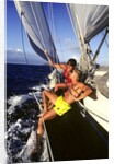 couple Enjoying The Ride On Deck Of Sailboat Heading Toward St. Vincent West Indies by Anonymous