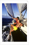 couple Enjoying The Ride On Deck Of Sailboat Heading Toward St. Vincent West Indies by Anonymous