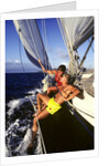 couple Enjoying The Ride On Deck Of Sailboat Heading Toward St. Vincent West Indies by Anonymous