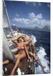 1990s Couple Sitting On Bow Of Sailboat Saint Lucia West Indies by Anonymous
