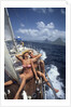 1990s Couple Sitting On Bow Of Sailboat Saint Lucia West Indies by Anonymous