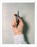 1970s Male Hand Holding Ball Point Ink Pen by Anonymous