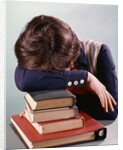 1960s 1970s Female Student Head Down On Pile Of Books Asleep Exhausted by Anonymous