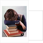 1960s 1970s Female Student Head Down On Pile Of Books Asleep Exhausted by Anonymous