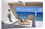 1990s Man And Woman On Sunny Deck Balcony Overlooking The Ocean by Anonymous
