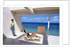 1990s Man And Woman On Sunny Deck Balcony Overlooking The Ocean by Anonymous