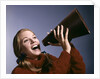 1960s Portrait Teen Cheerleader Girl Shouting Into Megaphone by Anonymous