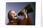 1960s Portrait Teen Cheerleader Girl Shouting Into Megaphone by Anonymous