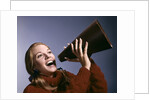 1960s Portrait Teen Cheerleader Girl Shouting Into Megaphone by Anonymous