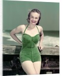 1940s Portrait Smiling Woman Wearing Green Velvet Bathing Suit Posing Leaning On Diving Board by Anonymous