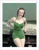 1940s Portrait Smiling Woman Wearing Green Velvet Bathing Suit Posing Leaning On Diving Board by Anonymous