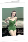 1940s Portrait Smiling Woman Wearing Green Velvet Bathing Suit Posing Leaning On Diving Board by Anonymous