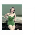 1940s Portrait Smiling Woman Wearing Green Velvet Bathing Suit Posing Leaning On Diving Board by Anonymous